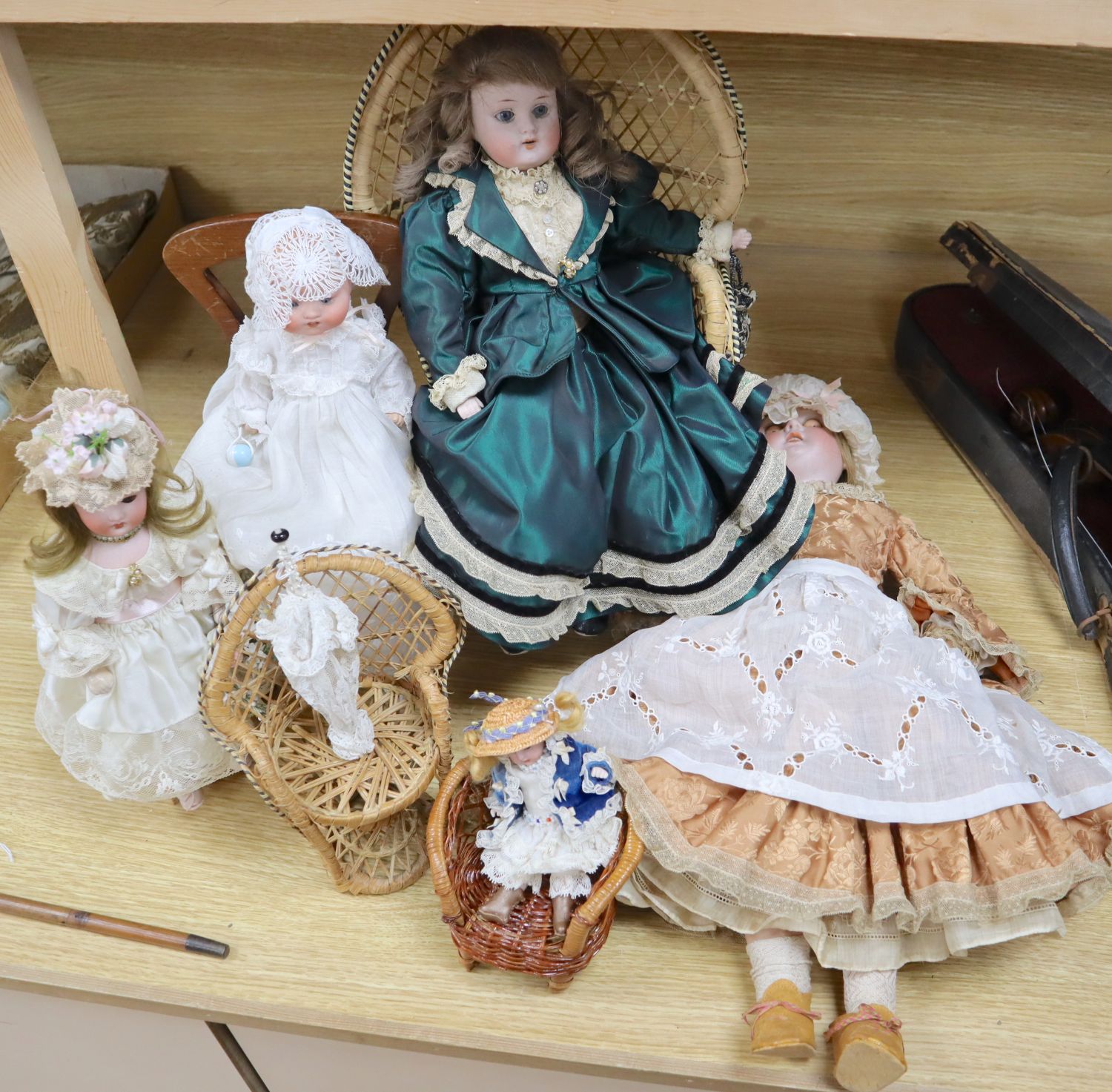 A small collection of bisque head dolls, including a Max Oscar Arnold example